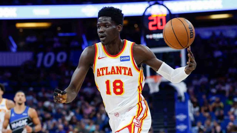 Atlanta Hawks forward Mouhamed Gueye (18) loses control of the ball as he drives against the Orlando Magic during the first half of an NBA basketball game Wednesday, April 1, 2026, in Orlando, Fla. (Kevin Kolczynski/AP)