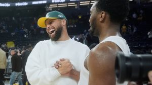 Golden State Warriors guard Stephen Curry, left, smiles while shaking hands with Cleveland Cavaliers guard Donovan Mitchell after an NBA basketball game in San Francisco, Thursday, April 2, 2026. (Jeff Chiu/AP)
