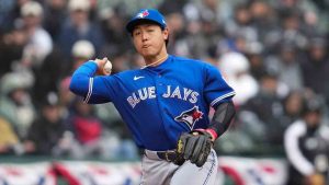 Toronto Blue Jays third baseman Kazuma Okamoto (7) throws out Chicago White Sox's Lenyn Sosa (50) at first base during the third inning of a baseball game Saturday, April 4, 2026, in Chicago. (Erin Hooley/AP)