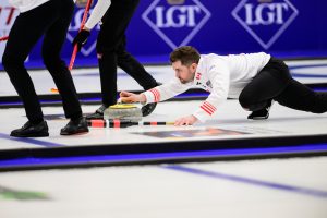 Canada's Matt Dunstone delivers the rock during a gold medal match against Sweden at the curling world championships, Saturday, April 4, 2026, in Ogden, Utah. (AP Photo/Tyler Tate)