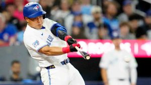 Toronto Blue Jays third baseman Kazuma Okamoto (7) hits a single during first inning MLB baseball action against the Los Angeles Dodgers, in Toronto on Monday, April 6, 2026. (Frank Gunn/CP)