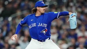 Toronto Blue Jays pitcher Kevin Gausman (34) works against the Los Angeles Dodgers during fourth inning MLB baseball action in Toronto on Tuesday, April 7, 2026. (Nathan Denette/CP)