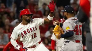A fight breaks out during the fifth inning of a baseball game between the Los Angeles Angels and the Atlanta Braves, Tuesday, April 7, 2026, in Anaheim, Calif. (Ethan Swope/AP)