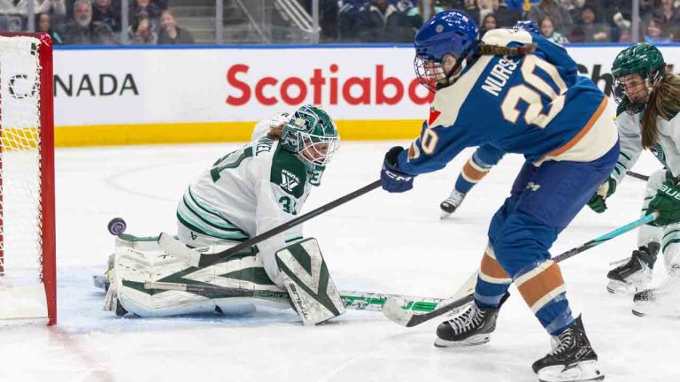 Boston Fleet goalie Aerin Frankel (31) makes a save on Vancouver Goldeneyes' Sarah Nurse (20) during third period PWHL hockey action in Edmonton on Tuesday, April 7, 2026. (Jason Franson/CP)