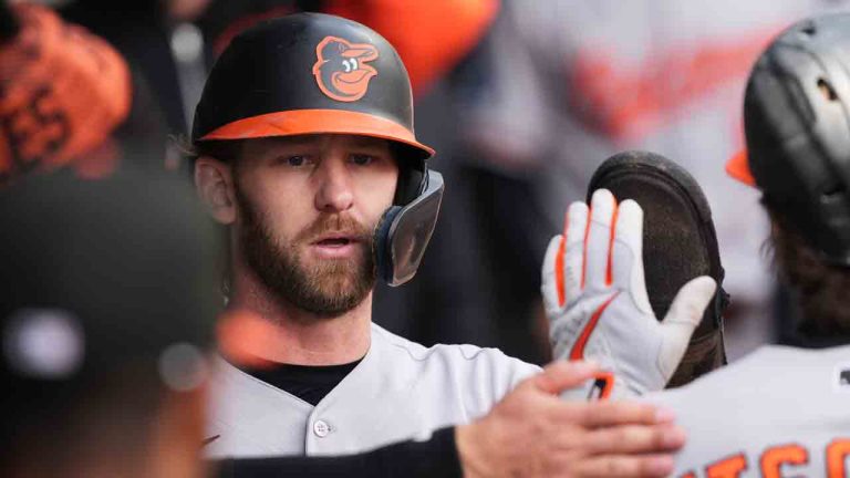 Baltimore Orioles' Taylor Ward celebrates with teammates after scoring on a ground out by Adley Rutschman during the third inning of a baseball game against the Chicago White Sox in Chicago, Wednesday, April 8, 2026. (Nam Y. Huh/AP)