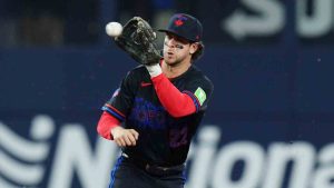Minnesota Twins' Austin Martin (16) steals second base ahead of the tag from Toronto Blue Jays second baseman Ernie Clement (22) during first inning MLB baseball action in Toronto on Friday, April 10, 2026. (Chris Young/CP)