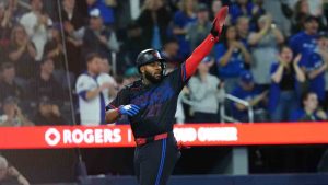 Toronto Blue Jays' Vladimir Guerrero Jr. (27) celebrates as he scores a run against the Minnesota Twins during fourth inning MLB baseball action in Toronto on Friday, April 10, 2026. (Chris Young/CP)
