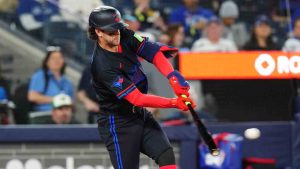 Toronto Blue Jays' Ernie Clement (22) hits an RBI double against the Minnesota Twins during sixth inning MLB baseball action in Toronto on Friday, April 10, 2026. (Chris Young/CP)