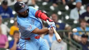 Toronto Blue Jays' Vladimir Guerrero Jr. hits an RBI double during the 10th inning of a baseball game against the Milwaukee Brewers, Tuesday, April 14, 2026, in Milwaukee. (Aaron Gash/AP)