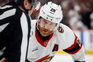 Ottawa Senators' Claude Giroux (28) waits for a face-off against the Carolina Hurricanes during the third period of an Game 1 of an NHL hockey Stanley Cup first-round playoff series in Raleigh, N.C., Saturday, April 18, 2026. (AP Photo/Karl DeBlaker)