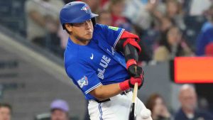 Toronto Blue Jays' Kazuma Okamoto (7) singles off Cleveland Guardians pitcher Matt Festa (52) during sixth inning MLB baseball action in Toronto on Saturday, April 25, 2026. (Chris Young/CP)