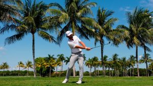 Cameron Young hits along the cart path on the first fairway during the first round of the Cadillac Championship PGA golf tournament Thursday, April 30, 2026, in Doral, Fla. (AP/David J. Phillip)