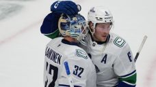 Canucks rise up to stun league-leading Avalanche