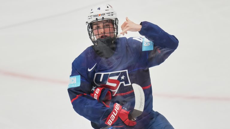 America's Caroline Harvey celebrates after scoring against Canada in the gold-medal game at the 2025 world championships in April 2025. (Photo by Petr David Josek/AP) 