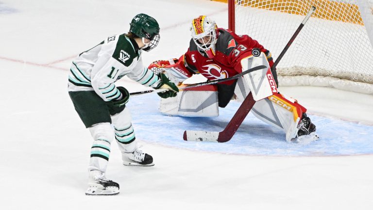 Ottawa Charge's goaltender Gwyneth Philips (33) blocks a shot by Boston Fleet's Alina Müller (11) during shootout PWHL hockey action in Ottawa, on Saturday, Feb. 28, 2026. (Spencer Colby/CP)