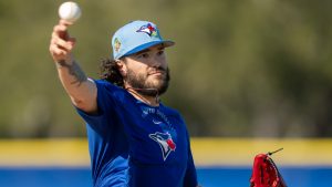 Toronto Blue Jays pitcher Cody Ponce makes a throw to first base during a drill at Spring Training in Dunedin, Fla., on Monday, Feb. 16, 2026. (Frank Gunn/CP)