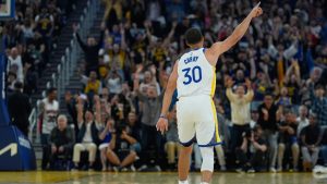 Golden State Warriors guard Stephen Curry celebrates after making a 3-point basket during the first half of an NBA basketball game against the Houston Rockets, Sunday, April 5, 2026, in San Francisco. (Godofredo A. Vásquez/AP)