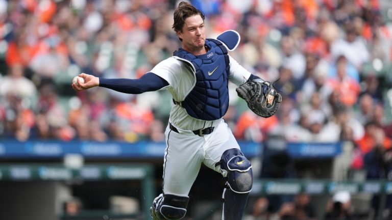 Detroit Tigers catcher Dillon Dingler throws to first base for an out on a St. Louis Cardinals' Victor Scott II bunt in the first inning of a baseball game Saturday, April 4, 2026, in Detroit. (AP Photo/Paul Sancya)