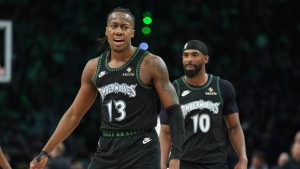Minnesota Timberwolves guard Ayo Dosunmu (13) celebrates after making a 3-point basket during the second half of Game 4 of a first-round NBA basketball playoff series against the Denver Nuggets, Saturday, April 25, 2026, in Minneapolis. (Abbie Parr/AP)