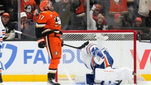 Anaheim Ducks left wing Alex Killorn, left, celebrates his goal as Edmonton Oilers goaltender Connor Ingram sits in goal during the second period of Game 3 in the first round of the NHL hockey Stanley Cup playoffs series Friday, April 24, 2026, in Anaheim, Calif. (Mark J. Terrill/AP)
