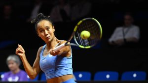 Canada's Leylah Fernandez hits a return to Kazakhstan's Elena Rybakina in the quarterfinal of the Stuttgart Open tennis tournament, Friday, April 17, 2026, in Stuttgart, Germany. (Katharina Kausche/dpa via AP)