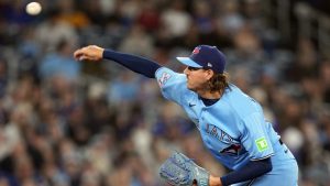 Toronto Blue Jays pitcher Kevin Gausman (34) throws a pitch against the Colorado Rockies during first inning MLB baseball action in Toronto on Wednesday, April 1, 2026. (Nathan Denette/CP)