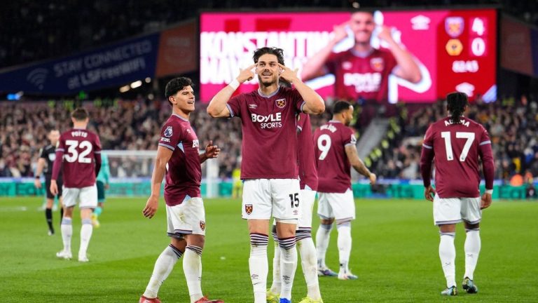 West Ham United's Konstantinos Mavropanos celebrates scoring their side's fourth goal of the game during their English Premier League match against Wolverhampton Wanderers in London, Friday, April 10, 2026. (Jordan Pettitt/PA via AP)