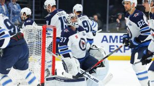 Winnipeg Jets goalie Connor Hellebuyck (37) attends warmups before an NHL hockey game against the Utah Mammoth, Tuesday, April 14, 2026, in Salt Lake City. (Melissa Majchrzak/AP)