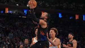 New York Knicks' Jalen Brunson drives past Atlanta Hawks' Dyson Daniels (5) during the first half in Game 5 of a first-round NBA playoffs basketball series, Tuesday, April 28, 2026, in New York. (Frank Franklin II/AP)