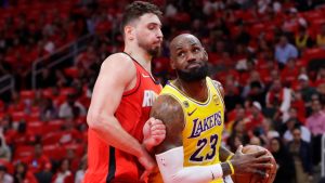 Los Angeles Lakers forward LeBron James (23) drives to the basket in front of Houston Rockets center Alperen Sengun, left, during the first half of Game 3 in a first-round NBA playoffs basketball series Friday April 24, 2026, in Houston. (Michael Wyke/AP)