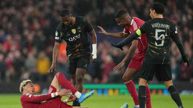 Liverpool's Hugo Ekitike lies injured during the Champions League quarterfinal second leg soccer match between Liverpool and Paris Saint-Germain. (Jon Super/AP)