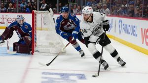 Los Angeles Kings right wing Alex Laferriere (14) skates against Colorado Avalanche defenseman Cale Makar (8) during the second period of Game 2 in the first round of the NHL hockey Stanley Cup playoffs, Tuesday, April 21, 2026, in Denver. (Jack Dempsey/AP)