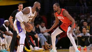 Los Angeles Lakers forward Lebron James, left, is defended by Houston Rockets forward Kevin Durant during the first half of an NBA basketball game, Thursday, Dec. 25, 2025, in Los Angeles. (Jayne Kamin-Oncea/AP)