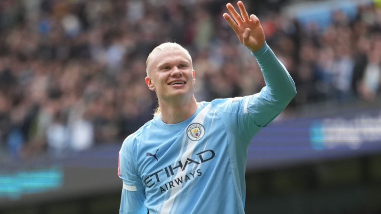 Manchester City's Erling Haaland celebrates after scoring his third goal during the FA Cup quarter-final soccer match between Manchester City and Liverpool in Manchester, England, Saturday, April 4, 2026. (AP Photo/Jon Super)