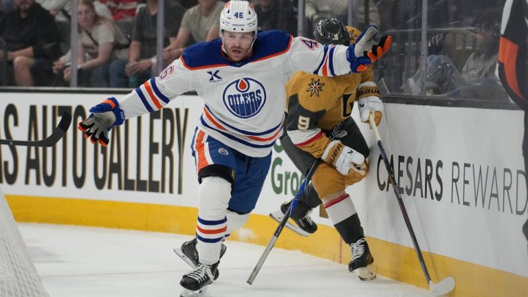 Edmonton Oilers left wing Max Jones (46) loses his stick against Vegas Golden Knights center Jack Eichel (9) during the first period of an NHL hockey game Thursday, March 26, 2026, in Las Vegas. (John Locher/AP)