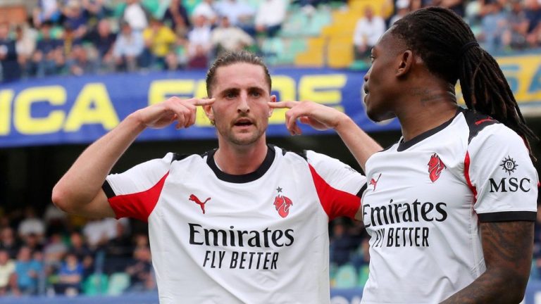 AC Milan's Adrien Rabiot, left, celebrates scoring during the Serie A soccer match between Hellas Verona and A.C. Milan in Verona, Italy, Sunday April 19, 2026. (Paola Garbuio/LaPresse via AP)
