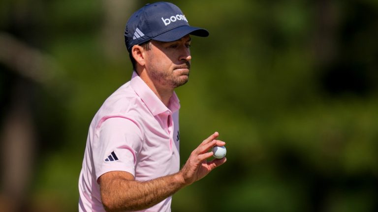 Nick Taylor, of Canada, waves after his putt on the seventh hole during the first round of the Masters golf tournament at the Augusta National Golf Club, Thursday, April 9, 2026, in Augusta, Ga. (Eric Gay/AP)