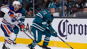 San Jose Sharks left wing William Eklund (72) looks for an open teammate next to Edmonton Oilers centre Connor McDavid (97) during the third period of an NHL hockey game, Wednesday, April 8, 2026, in San Jose, Calif. (Godofredo A. Vásquez/AP)