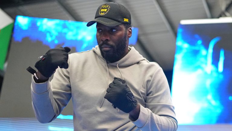 Britain's Lawrence Okolie warms up during a public workout at BoxPark near Wembley Stadium in London, Wednesday, July 16, 2025 ahead of his heavyweight boxing fight against on Saturday. (Kirsty Wigglesworth/AP)