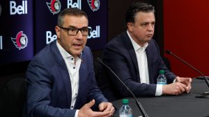 Ottawa Senators general manager Steve Staios, left, and head coach Travis Green speak to media during a year end press conference in Ottawa on Monday, April 27, 2026. (Patrick Doyle/CP)