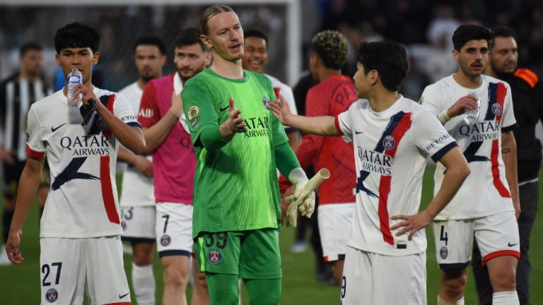 PSG's goalkeeper Matvey Safonov celebrates with PSG's Lee Kang-in after the French League One soccer match between Angers and Paris Saint-Germain in Angers, western France, Saturday, April 25, 2026. (Mathieu Pattier/AP)