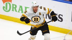 Boston Bruins right wing David Pastrnak (88) celebrates his goal during the overtime period in Game 5 of a first-round NHL hockey Stanley Cup playoff series against the Buffalo Sabres Tuesday, April 28, 2026, in Buffalo, N.Y. (Jeffrey T. Barnes/AP)