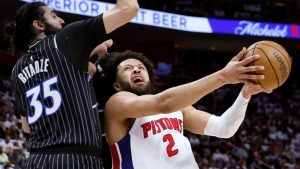Detroit Pistons guard Cade Cunningham (2) goes to the basket against Orlando Magic center Goga Bitadze (35) during the first half in Game 1 of a first-round NBA basketball playoffs series Sunday, April 19, 2026, in Detroit. (Duane Burleson/AP)