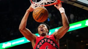 Toronto Raptors forward Scottie Barnes (4) slam dunks the ball during first half NBA basketball action against the Brooklyn Nets, in Toronto, Sunday, April 12, 2026. (Frank Gunn/CP)