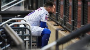 New York Mets' Bo Bichette sits in the dugout after the second baseball game of a doubleheader against the Colorado Rockies, Sunday, April 26, 2026, in New York. (AP Photo/Seth Wenig)