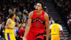 Toronto Raptors' Scottie Barnes (4) celebrates a basket against the Los Angeles Lakers during second half NBA basketball action in Toronto on Thursday, Dec. 4, 2025. (Frank Gunn/CP)