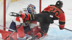 Ottawa Senators Fabian Zetterlund (20) flies past Florida Panthers goaltender Sergei Bobrovsky (72) during first period NHL action in Ottawa on Thursday, April 9, 2026. (Adrian Wyld/CP)