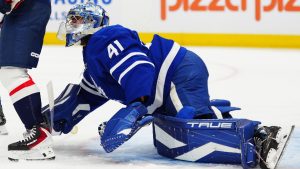 Toronto Maple Leafs goaltender Anthony Stolarz (41) goes down with an injury against the Washington Capitals during first period NHL hockey action in Toronto on Wednesday, April 8, 2026. (Frank Gunn/CP)