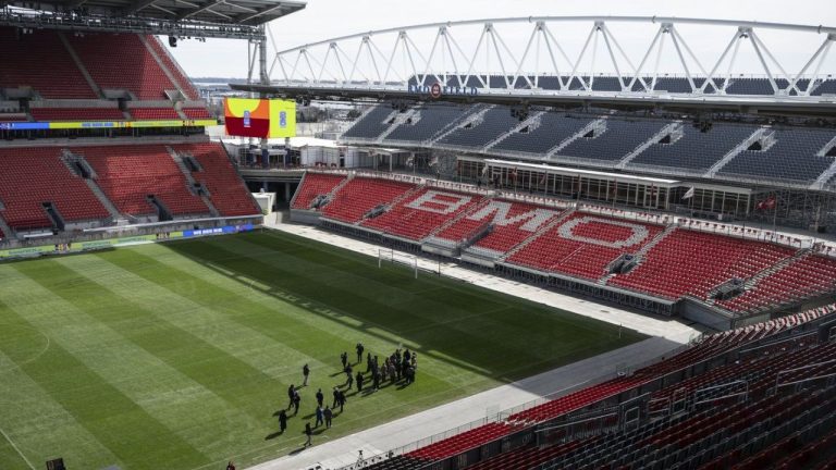 Media are seen on the pitch of BMO Field during a tour organized by MLSE and the City of Toronto to showcase the stadium’s upgrades ahead of hosting six FIFA World Cup 2026 matches in Toronto, Ont., March 24, 2026. (Eduardo Lima/CP)