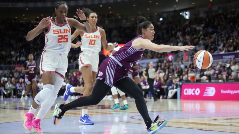 Toronto Tempo Kia Nurse (11) drives past Connecticut Sun Rayah Marshall (25) and Olivia Nelson-Ododa (10) during second half pre-season WNBA basketball action in Toronto on Wednesday, April 29, 2026. (Nathan Denette/CP)